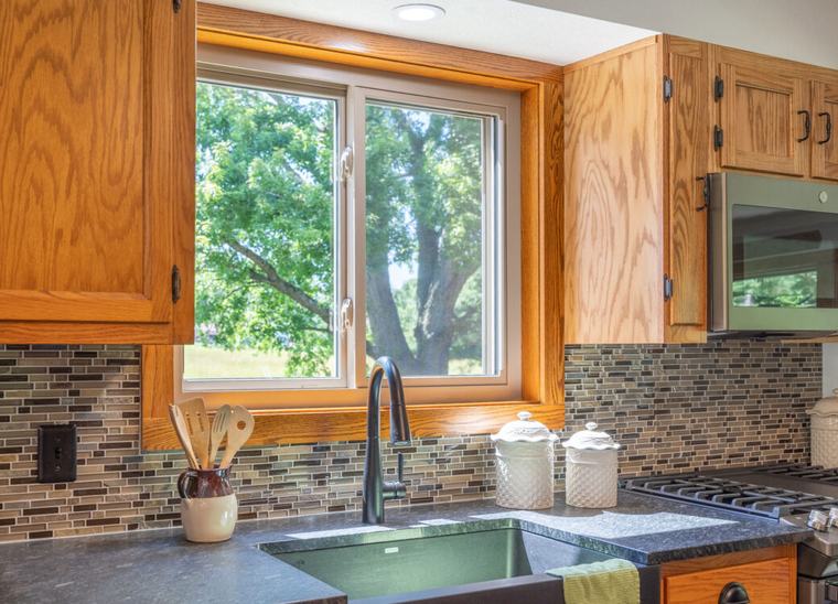 A ProVia slider window above a kitchen sink